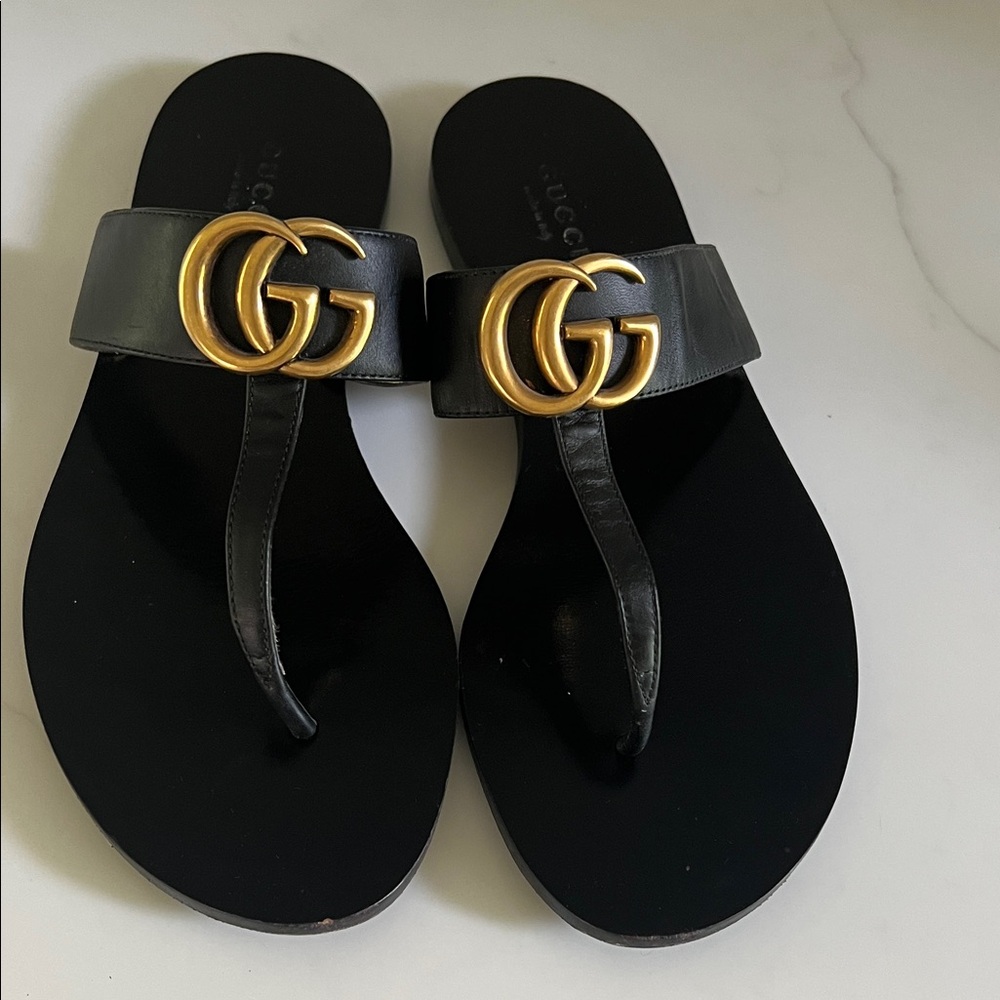 Gucci Black Leather Sandals with Gold Emblem